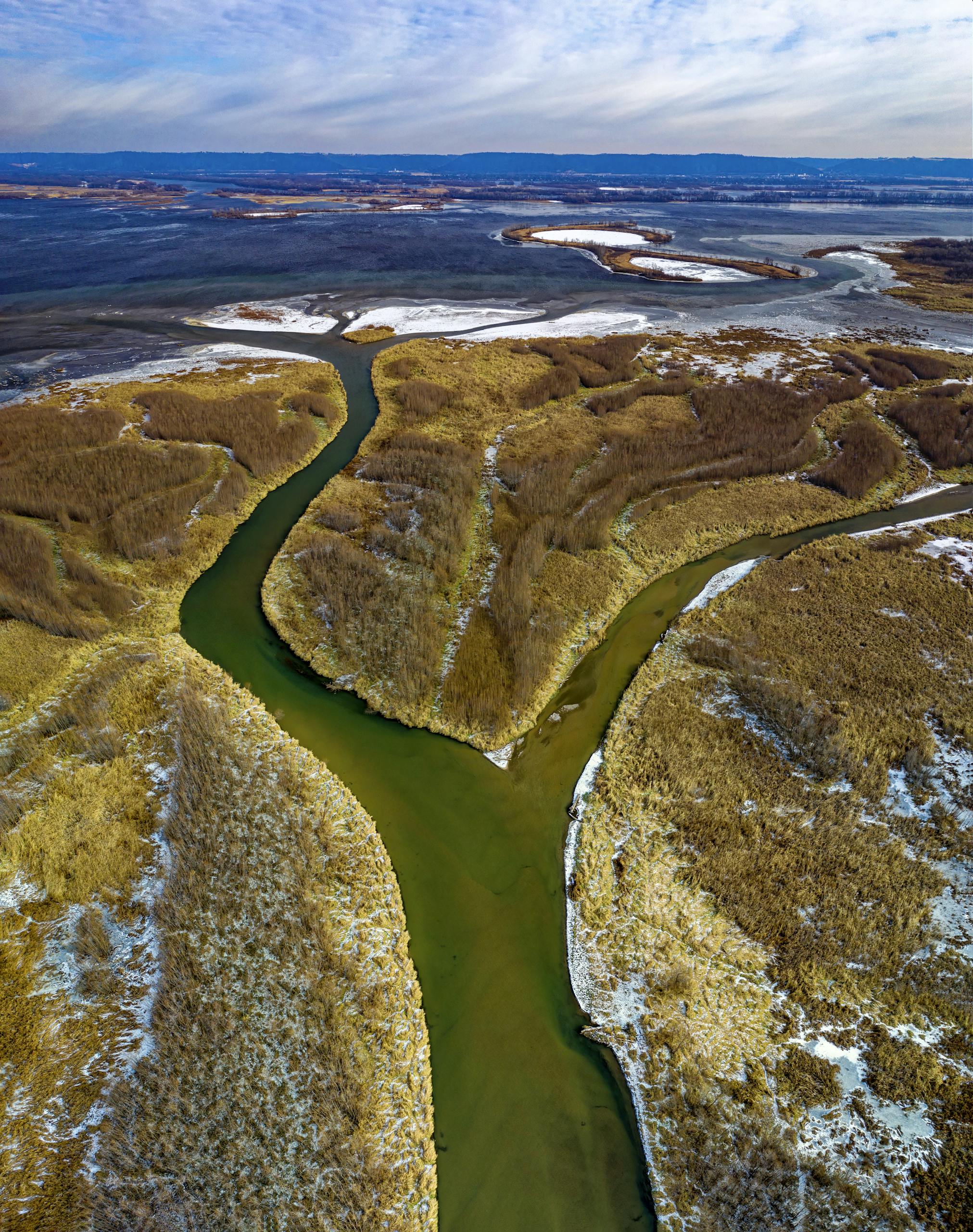 Stunning aerial view of a river delta winding through a natural landscape in Altura, Minnesota.