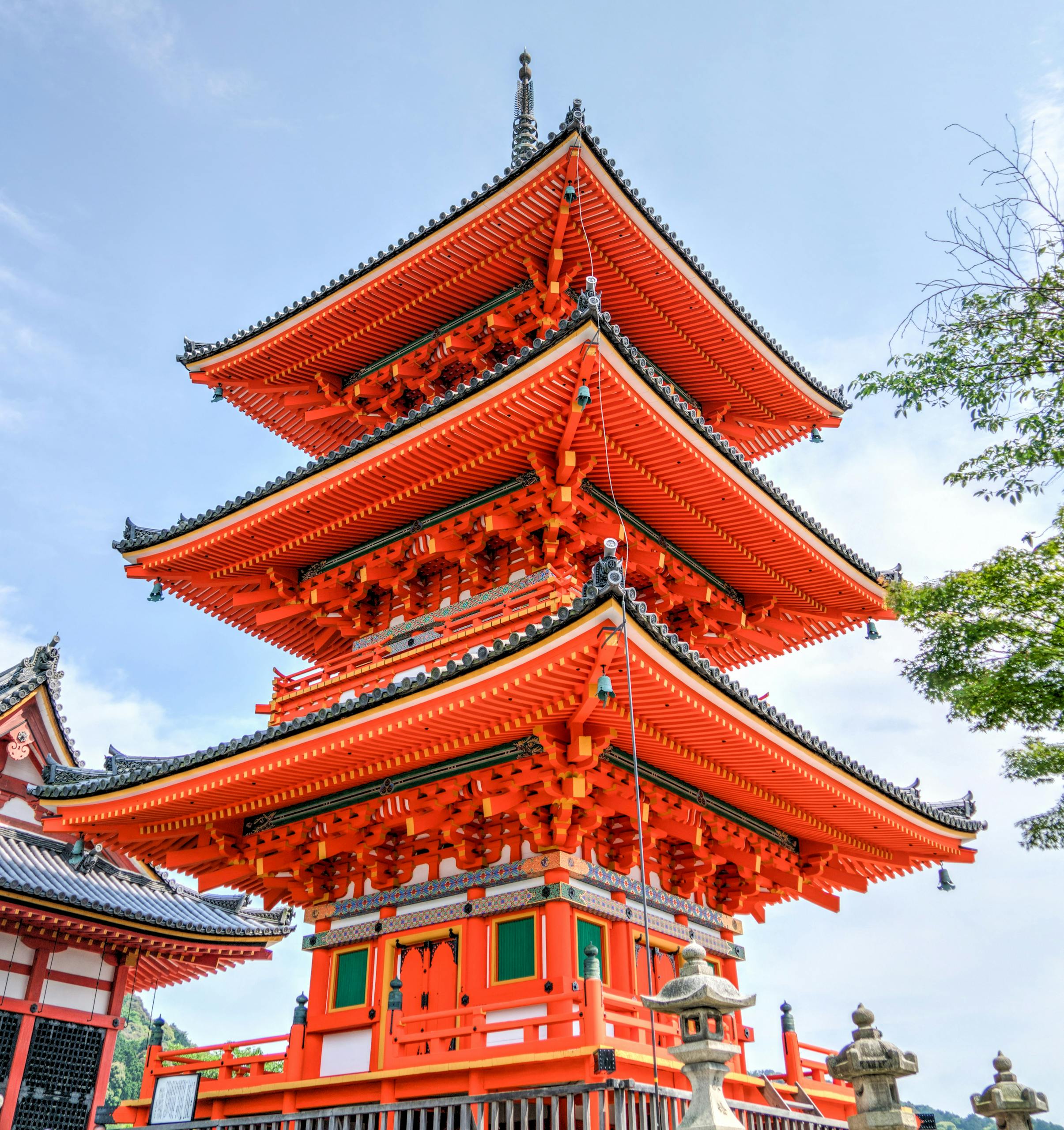 Vibrant pagoda at Kiyomizu-dera temple, a prominent landmark in Kyoto, Japan.